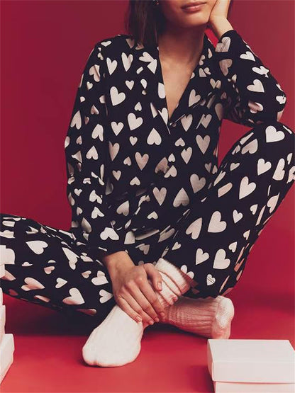 A Set of Women's Comfortable Polyester Pajamas - Leisure V Collar Long Sleeve Top with Lapel Buttons and Trousers - Geometric Heart Pattern Knitted Fabric Autumn and Winter Pajamas